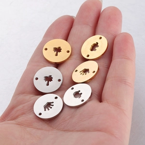Polished stainless steel double-hole round charms with elephant and palm tree engravings