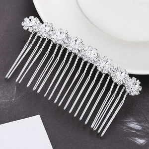 Silver bridal hair comb featuring sparkly rhinestone sunflower and pearl crystal accents