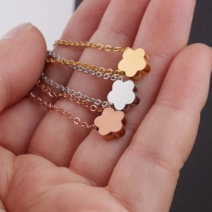 Polished stainless steel flower necklaces in gold, silver and rose gold finishes