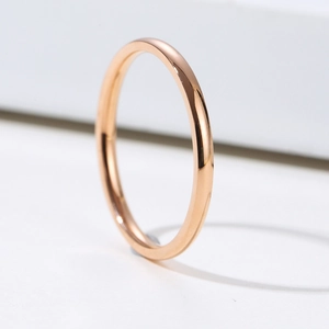Minimalist slim rose gold stainless steel ring with a polished finish for daily styling
