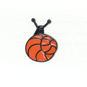 Detailed view of the bright orange enamel snail brooch with black spiral shell patterns