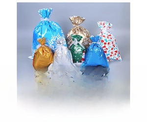 Detail of Christmas candy bags with ribbon drawstrings for cookies and snacks