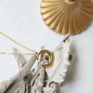 18K gold plated crescent moon pendant necklace with micro-paved crystal on cross chain