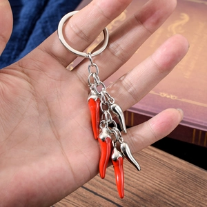 Handheld creative metal chili pepper pendant keychain with red and silver charms