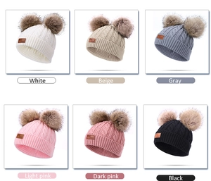 Winter cable knit beanie for children featuring dual fluffy pom poms in six colors