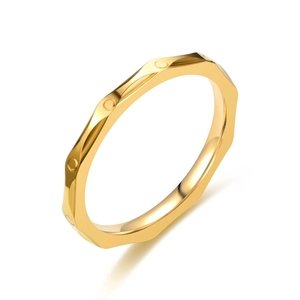 Elegant gold titanium steel ring featuring unique geometric facets and round stud details