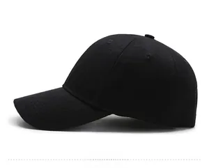 Side view of a black cotton baseball cap showing twill fabric texture and curved brim