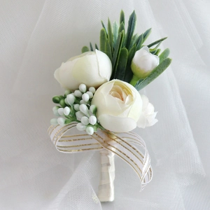 Elegant white artificial rose boutonniere with green leaves and gold-edged ribbon