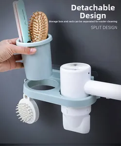 Detail showing the split design of a light blue wall-mounted hair dryer storage holder