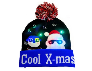 Close-up of LED knit Christmas beanie featuring festive patterns and Cool X-mas text