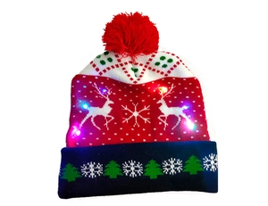 Detailed knit of Christmas beanie with reindeer patterns and glowing LED light accents