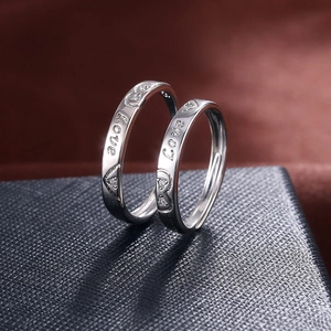 Silver adjustable couple rings with Love engraving and heart-shaped crystals