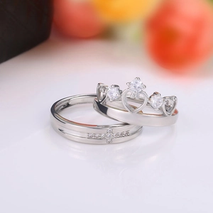 Elegant crown and cross couple ring set in silver finish with sparkling gemstones