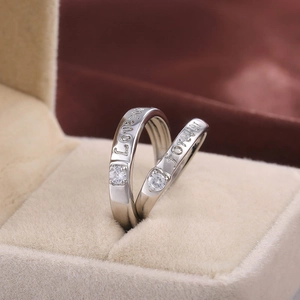Silver couples ring set with 'Forever Love' engraving and sparkling round-cut gemstones