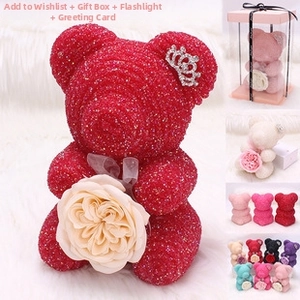Sparkly gift bear with champagne rose in luxury transparent boxes with ribbons