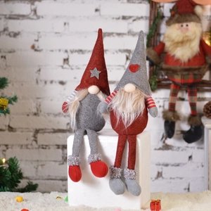 Handmade Scandinavian Christmas gnomes with long legs in red and grey festive colors