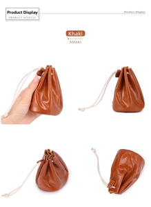 Detail view of the khaki leather drawstring coin purse showing its texture and compact size