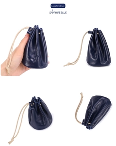 Detail view of sapphire blue oil wax leather drawstring pouch for coins and lipsticks