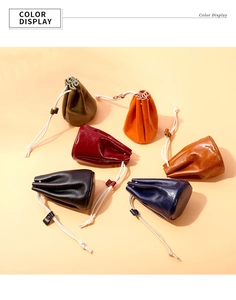 Compact drawstring coin purses in six colors made of glossy oil wax leather