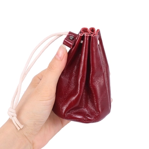 Dark red oil wax leather drawstring pouch for jewelry and lipstick storage