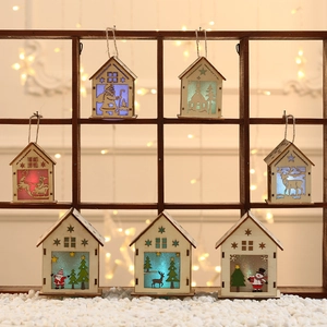 LED lit wooden Christmas house ornaments with reindeer and snowman cutout patterns