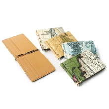 Detail view of tri-fold wallet with card slots and vintage world map pattern design