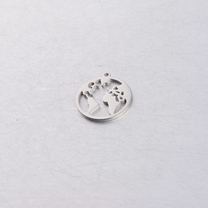 Macro view of silver stainless steel world map pendant with hollow-out mirror finish
