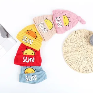 Thick winter knit beanies for kids with SUN embroidery and smiling sun pattern
