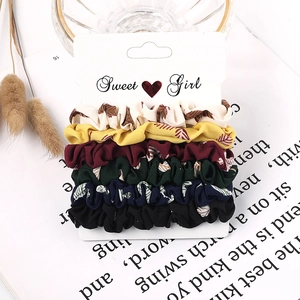 Set of 6 chiffon scrunchies with white leaf patterns on heart-shaped display card