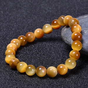 Bracciale di perle in occhio di tigre dorato naturale con brillante effetto occhio di gatto