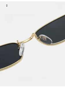 Detail of comfortable silicone nose pads and premium gold metal bridge of sunglasses