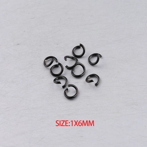 Macro shot of 1x6mm black stainless steel jump rings for DIY jewelry making accessories