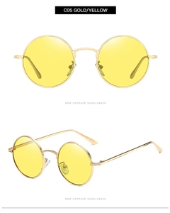 Detail view of model C05 vintage round gold metal sunglasses with yellow lenses