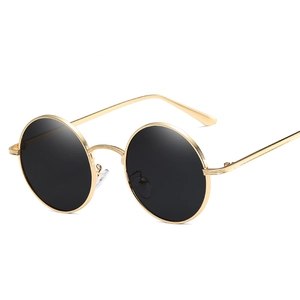 Retro round metal frame sunglasses with dark lenses for men and women street style