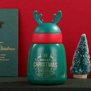 Christmas reindeer insulated mug in red and green festive theme with golden reindeer horns