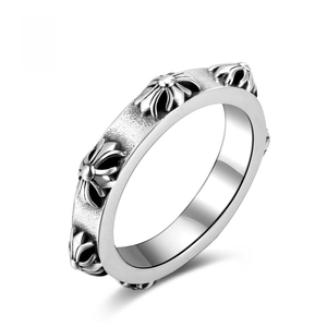 Macro detail of gothic skull ring showing oxidized relief and polished inner band