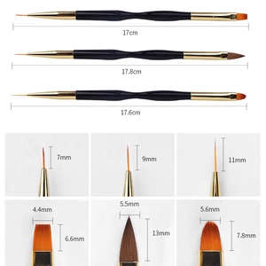 Macro detail of 4 double-ended nail art brushes with professional black ergonomic handles