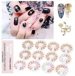 Detail of 11-compartment wheel box with gold star and moon metal nail art rivets