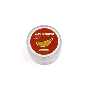 Detailed view of banana-scented eyelash glue remover cream in a 5g mini container