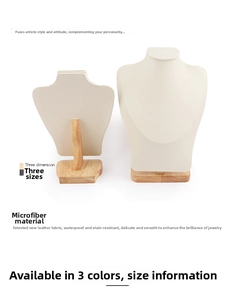 Detail of beige microfiber jewelry bust with premium solid wood base for necklaces