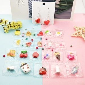 Assorted creative resin pendants including heart, fruit, and animal shapes for DIY jewelry