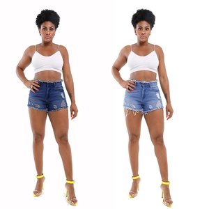 Women's ripped denim shorts with high waist and fringe hem in dark and light blue