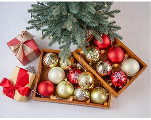 Macro shot of 8cm colorful Christmas balls in varied textures on a rustic wooden tray