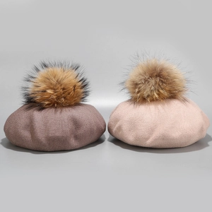 Knitted wool beret hats for women with large fluffy fur pom poms in cocoa and pink