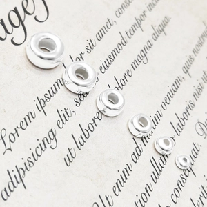 Detail showing 6 sizes of 925 sterling silver spacer beads for DIY jewelry making