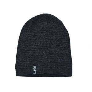 Detail view of dark grey chenille knitted beanie with white SPORTS label and soft texture