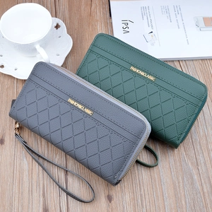 Women's dual-zipper long wallet with plaid texture and wristlet on wooden background