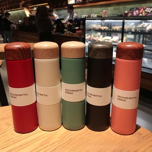 Mini 250ml vacuum insulated bottles in five colors with wood grain textured lids