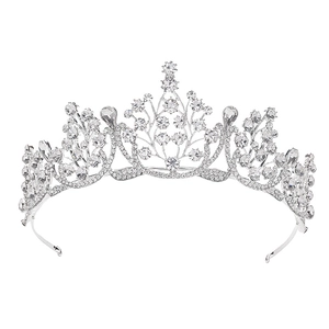 Macro shot of silver vintage bridal crown with intricate crystal floral openwork