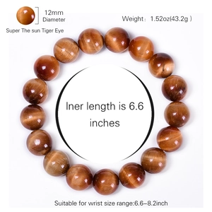 Natural 12mm tiger eye gemstone bead bracelet with silky golden brown chatoyancy